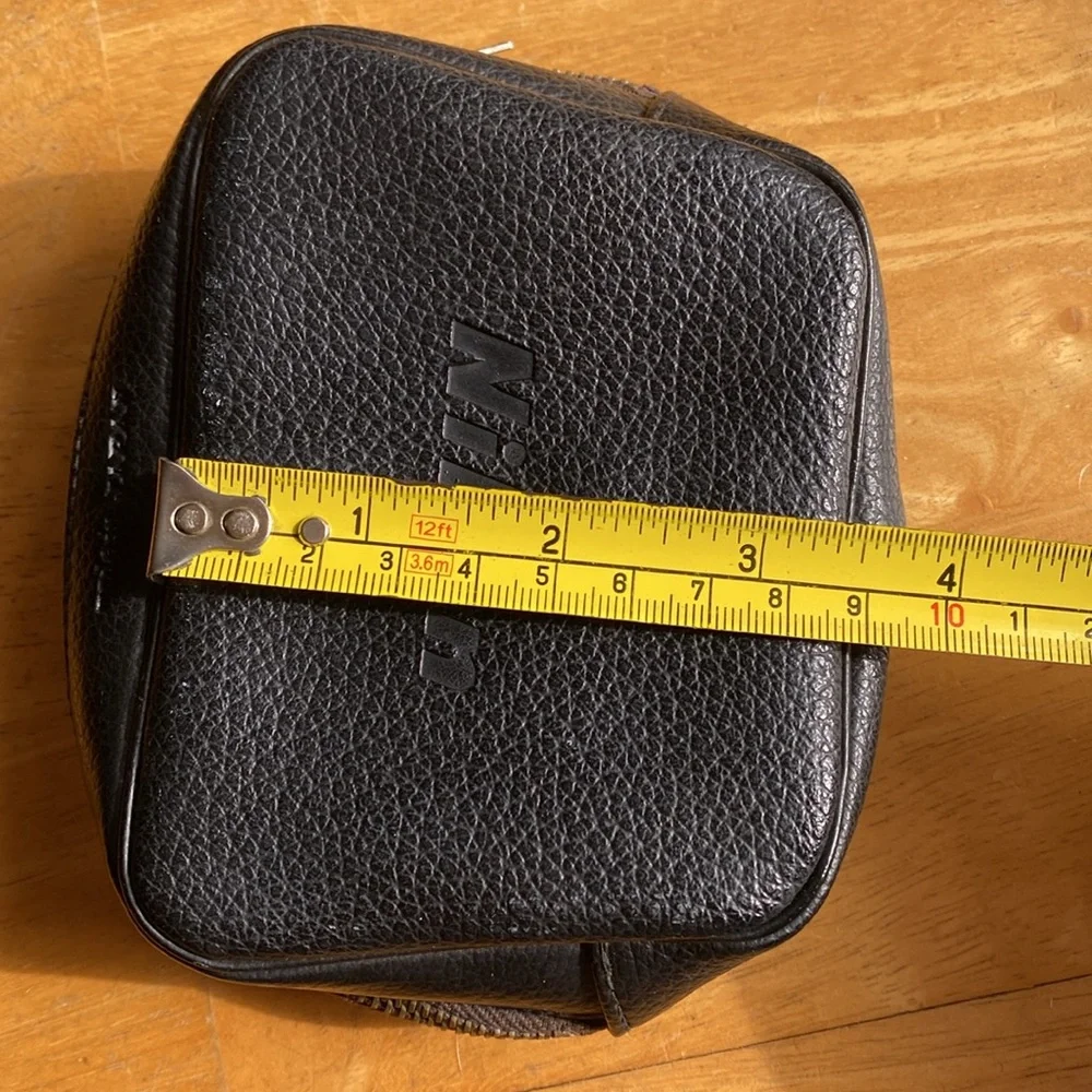 Vintage Nikon 3,5” case vintage with hole, the zipper is still working